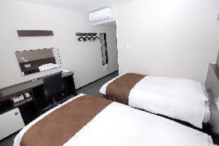 Hotel New Amami Habitación foto