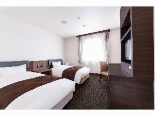 Hotel New Amami Habitación foto