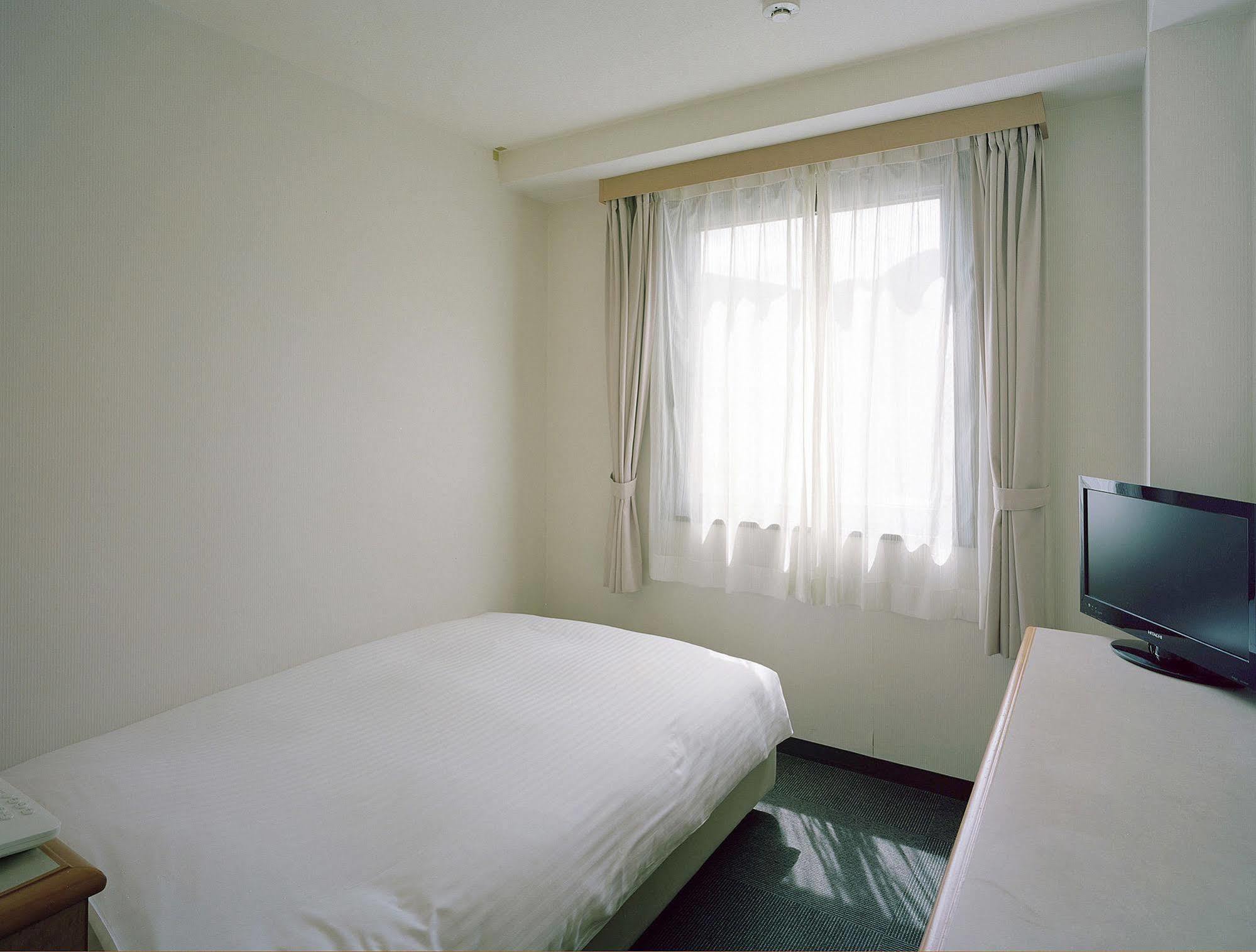 Hotel New Amami Exterior foto